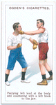 Parrying left lead at the body and countering with a left hook to the jaw.