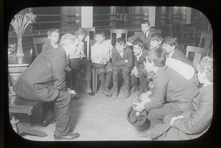 boys listening to story hour at the Library