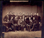 Group of USSC personnel; eight seated in front, ten standing in rear.