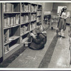 Interior, children at bookshelves, Francis Martin Branch