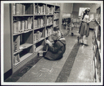 Interior, children at bookshelves, Francis Martin Branch