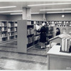 Interior, patrons at bookshelves, Francis Martin Branch