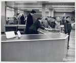 Opening week, Mrs. Kirby and Mrs. Horton at circulation desk