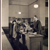 Librarian at desk with patron