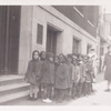 Children in line waiting to go into library