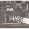 Exterior, window display: Dolls Dressed by Girl Scout Troop 194