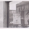 Exterior, window display asking patrons to give books to the army and navy