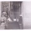 Exterior, children looking in at window display