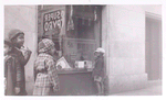 Exterior, children looking in at window display