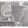 Exterior, man looking in at window display