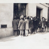 Exterior, children looking in at window display