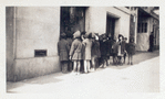 Exterior, children looking in at window display