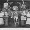Entrance to North Carolina Exhibit, C. H. Williamson, Commissioner, and his two assistants.