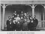 A group of officers and teachers.