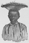 Young African-American boy carrying basket on his head.