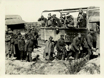 The American Advance in the Argonne region. France. A truck load of slightly wounded American soldiers heroes of the fighting in the Argonne, watch with grim satisfaction a file of captured Germans pass by.