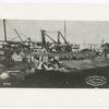 Battalion of the 9th U.S. Infantry coming ashore at Tonku, China, 7-11-1900.