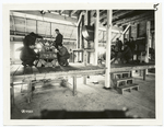 Class in engineering School - testing motors on blocks. Hazelhurst Field, L.I.