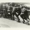 Real action. Ramming a hugh shell into a giant mortar.