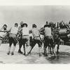 Ramming a shell into a disappearing gun.