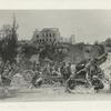American advance in the Argonne region. An American battery of 155 mm's howitzers firing upon the columns of retreating Germans from a position in the ruins of the captured town of Varennes. France.