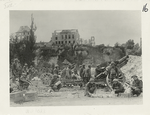 American advance in the Argonne region. An American battery of 155 mm's howitzers firing upon the columns of retreating Germans from a position in the ruins of the captured town of Varennes. France.