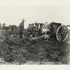 Howitzers in action - unid. Ussc view.