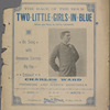 Two little girls in blue