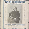 Two little girls in blue
