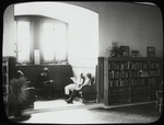 People reading in the window seats, Main Children's room, 1914