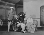 Yacht scene (by Sovey). L to R: Earle Larimore (as Sam Evans), Glenn Anders, seated (as Edmund Darrell), Tom Powers (as Charles Marsden), and Lynn Fontanne (Nina).