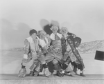 Marx brothers: Harpo, Chico, Zeppo and Groucho (as musketeers).