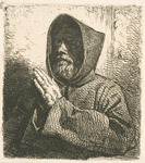 Tête de moine en prière.
