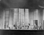 L to R: Henry Travers, Edgar Kent, Frederick Roland, Sylvia Field (standing), Earle Larimore, seated on table, Harry Mestayer and Sydney Greenstreet in R.U.R. Theatre Guild Tour Company Production, 1928-29. Set Designed by Lee Simonson.