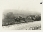 Three wrecked tanks in front of  a German machine-gun nest, which they put out of action before they were stopped. Chennery, Ardennes, Nov. 7, 1918.
