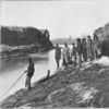 Federal engineers standing along canal.]