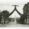 Eagle Gate with state capitol.