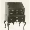 Desk on cabriole legged frame.