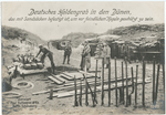 Deutsches Heldengrab in den Dünen, das mit Sandsäcken befestigt ist, um vor feindlichen Kugeln geschützt zu sein.
