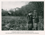 Rambling through the November woods. John Burroughs and Clyde Fisher examining an herb-roboert flower near Slabsides. [from 'Natural History, Sept. - Oct. 1931, pg. 501].