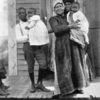 Three generations of Louisiana negroes; Grandmother can only talk Creole French; mother talks French and English; boy only talks English.