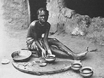 A woman making clay pots