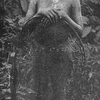 A girl from the Central St. Paul's River, with hand fishing net