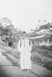 A Gbandi horn-blower blowing ivory trumpet (at Gene, Mano River, Western Liberia)