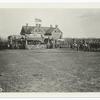 Graduating excercises, 2nd officers training camp, Fort Meyer, Va. Marching past reviewing stands (W. Wilson, Baker, and L. Col. Charles W. Fenton Calvary, Post Commander in reviewing stand)