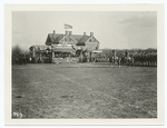 Graduating excercises, 2nd officers training camp, Fort Meyer, Va. Marching past reviewing stands (W. Wilson, Baker, and L. Col. Charles W. Fenton Calvary, Post Commander in reviewing stand)