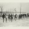 Scene at student officers training camp at Fort Sheridan, Ill., showing attack wave jumping barbed wire entanglements, 11-1917