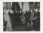 President Wilson pays a call on Italy. On the Railway at Rome as President Wilson departs for Genoa. A U.S. Signal Corps photographer made a flashlight of the group present at the farewell. To the President's right stands the King (in uniform), the Queen, then Mrs. Wilson.