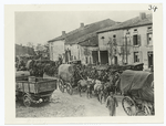 Columns of German prisoners march in rain toward prison pens back of Amer. [American] line, St. Mihiel salient, Sept. 12, 1918