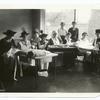 Mrs. Robt. [Robert] Lansing's sewing circle working to aid the Red Cross (Mrs. Lansing, wife of the Secy [Sectretary] of State, seated on the extreme right) (1-9-1918)